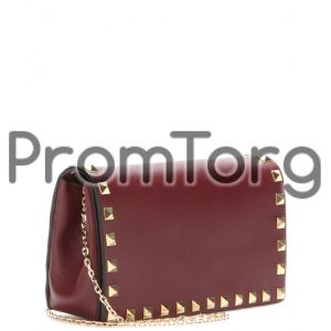 Rockstud leather clutch